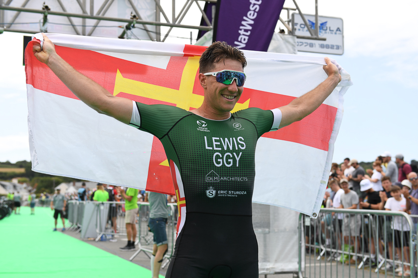 Josh_Lewis_win_Island_Games_triathlon_flag.jpg