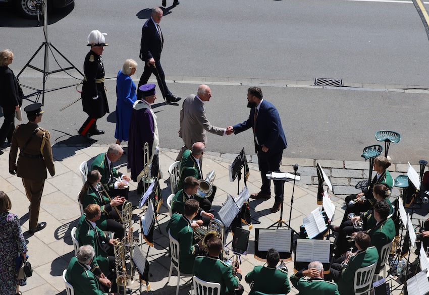 Royal_Visit_2024_King_Charles_shakes_hands_band_leader.JPG