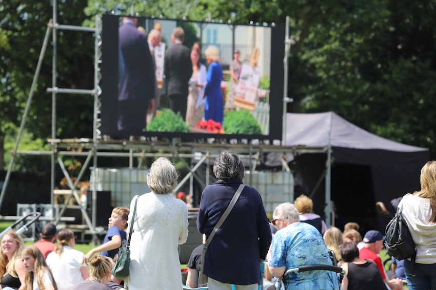 Royal_Visit_2024_Cambridge_Park_watching_big_screen.JPG