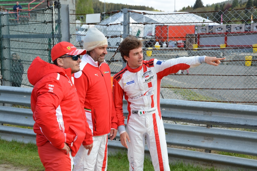 FRANCORCHAMPS / BELGIUM - MAY 3 2018: Francesco Castellacci pointing something out to his team mates Thomas Flohr and Giancarlo Fisichella, FIA WEC Total 6 Hours of Spa-Francorchamps on May 3, 2018.