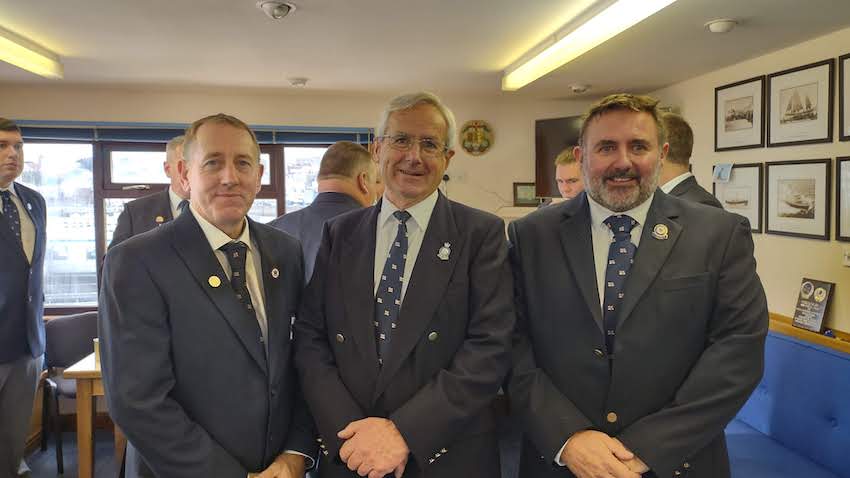 Jason_Norman_coxswain_Jim_Le_Pelley_chairman_of_the_Lifeboat_Management_Group_and_Jason_Hobbs_LOM_at_St_Peter_Port_lifebato_station.jpg