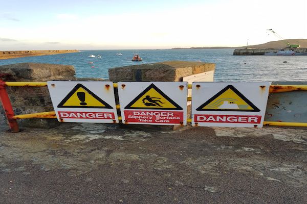 Alderney breakwater safety signs.jpeg
