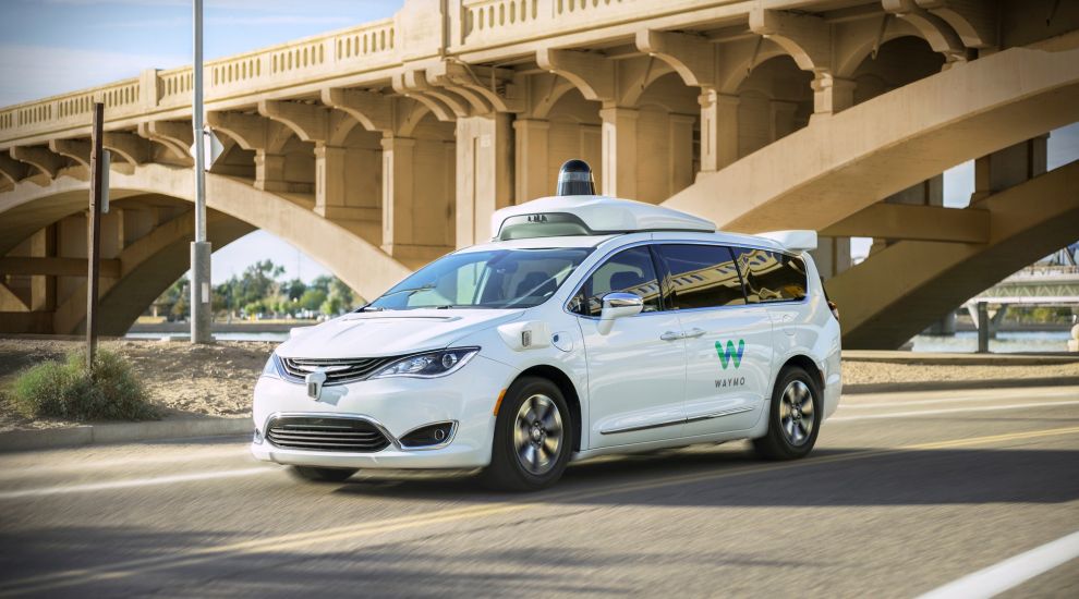 Waymo launches trial ride-hailing service with self-driving car