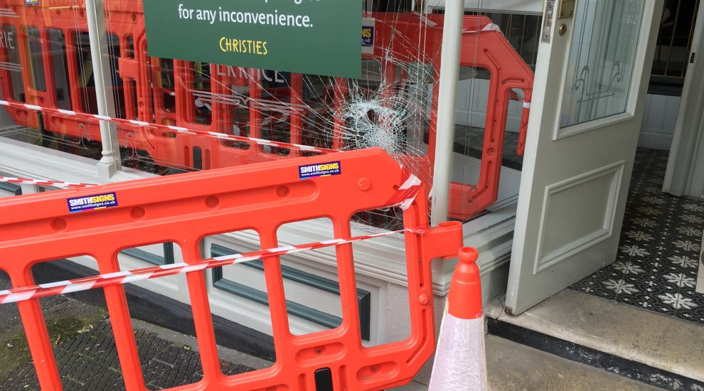 Call for witnesses after Christies' window smashed