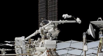 Spacewalkers carry out maintenance on cosmic ray detector