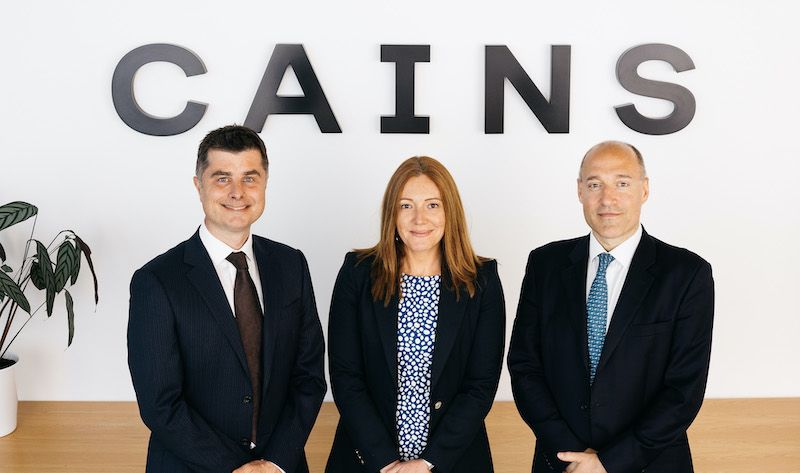 Cains becomes TISE member