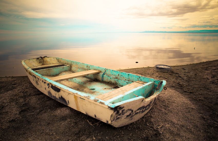 Abandoned boats being disposed of or sold