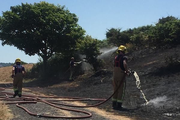 Fire service feels the heat as the island swelters