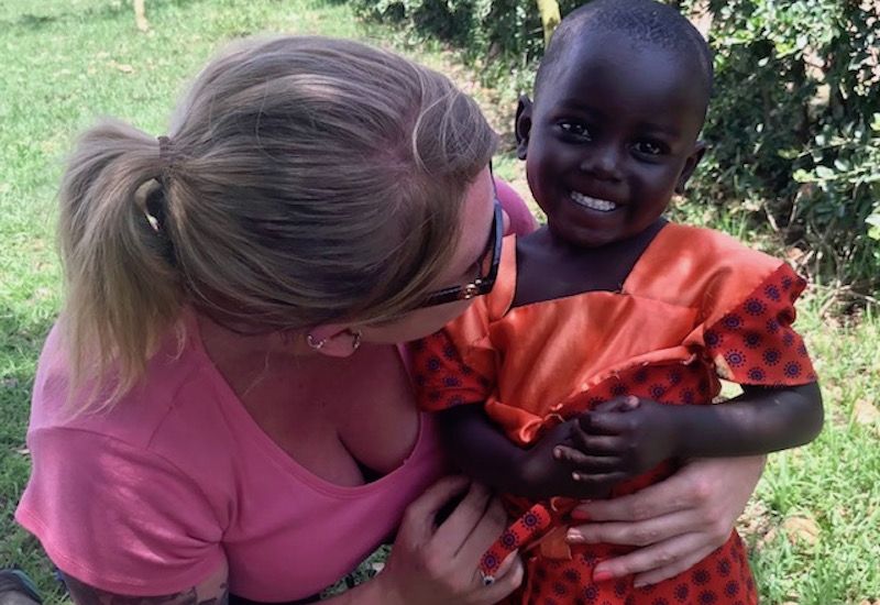 Local woman takes charity work global