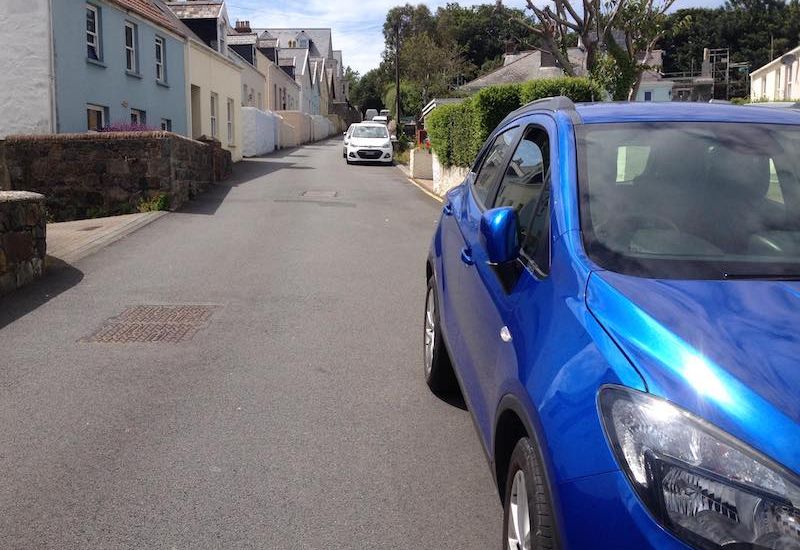 Parked cars hit by another vehicle