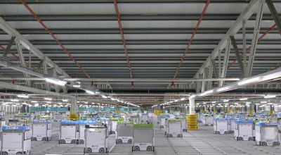 See the Ocado robots whizz around their automated supermarket warehouse