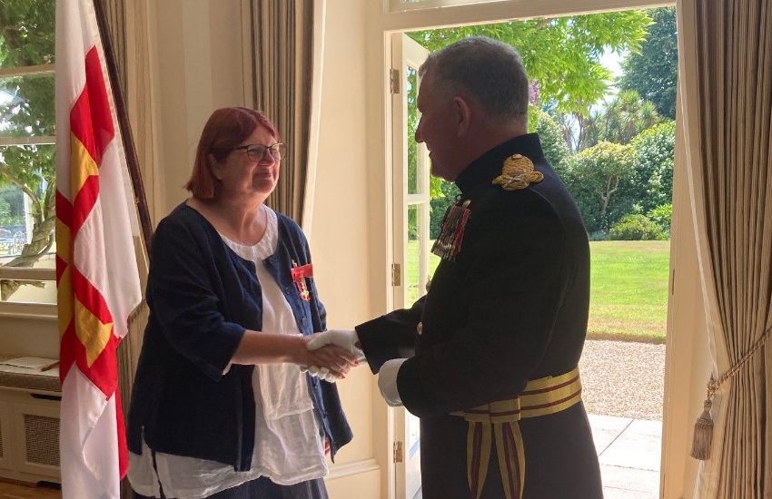 Educationalist presented with OBE