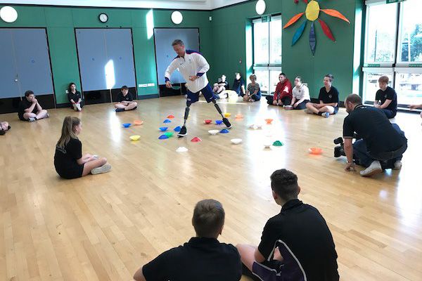 Paralympian teaches PE at Le Murier School